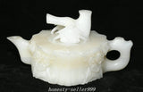 Carved white peony teapot with spout, handle, and knob lid