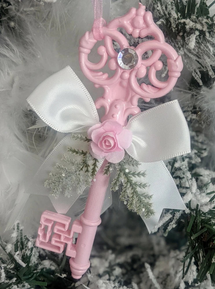 Antique-style key Christmas ornament with pink roses, bows, and glitter accents