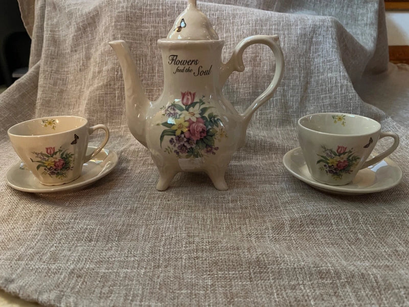 Vintage floral teapot with two cups and saucers, white ceramic set