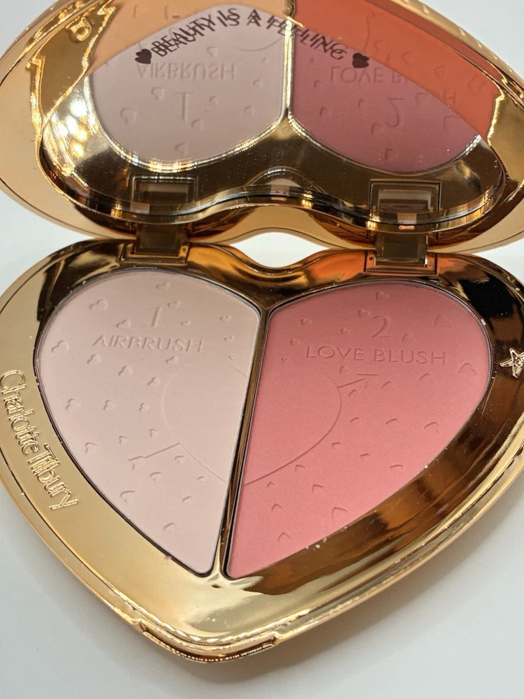 Charlotte Tilbury heart-shaped face palette compact with light and rosy pink blush pans