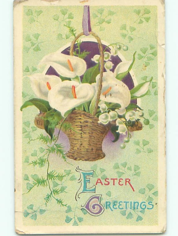 Easter greetings postcard with woven basket of white lily of the valley flowers and leaves