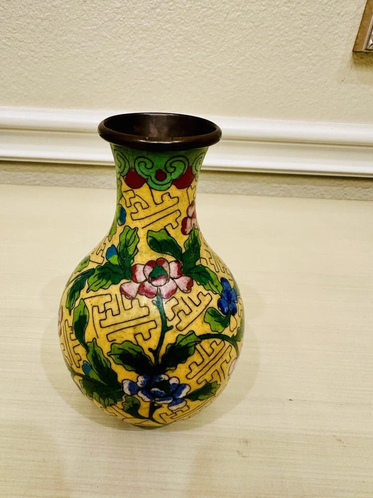 Cloisonné vase with yellow body, peony floral motif, and brass rim
