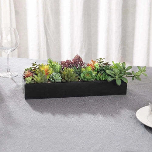 Artificial succulent plants in rectangular black wood planter box, mixed green and purple foliage