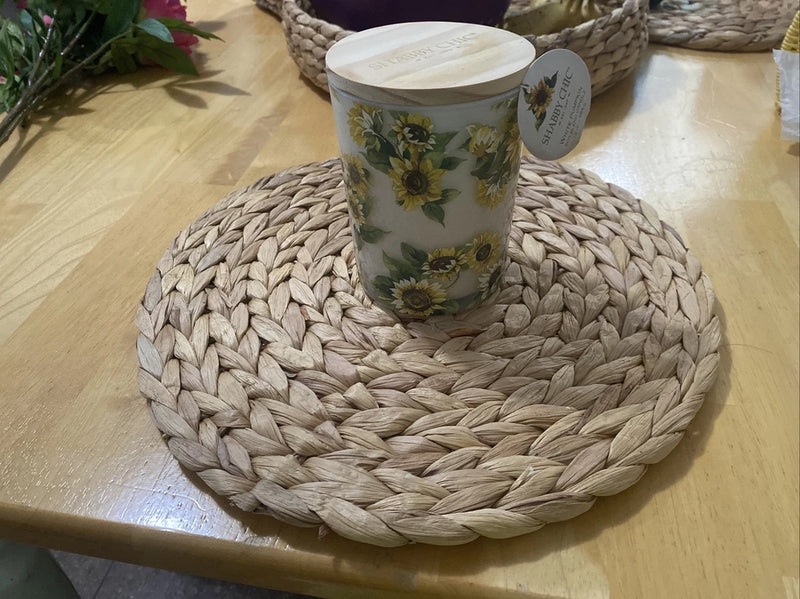 Sunflower printed candle in white glass on woven round coaster