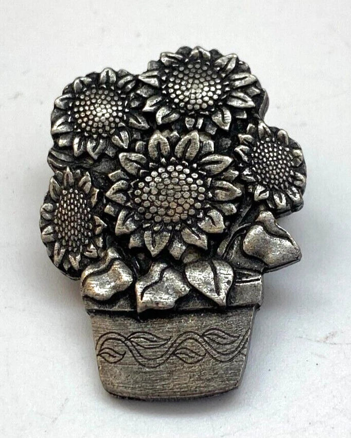 Pewter sunflower cluster pin in textured pot, limited edition look.