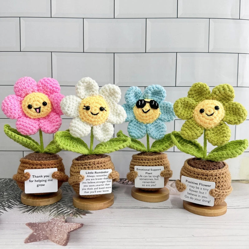 Crochet emoji sunflower desk decor with smiling face on wooden base, with small tag