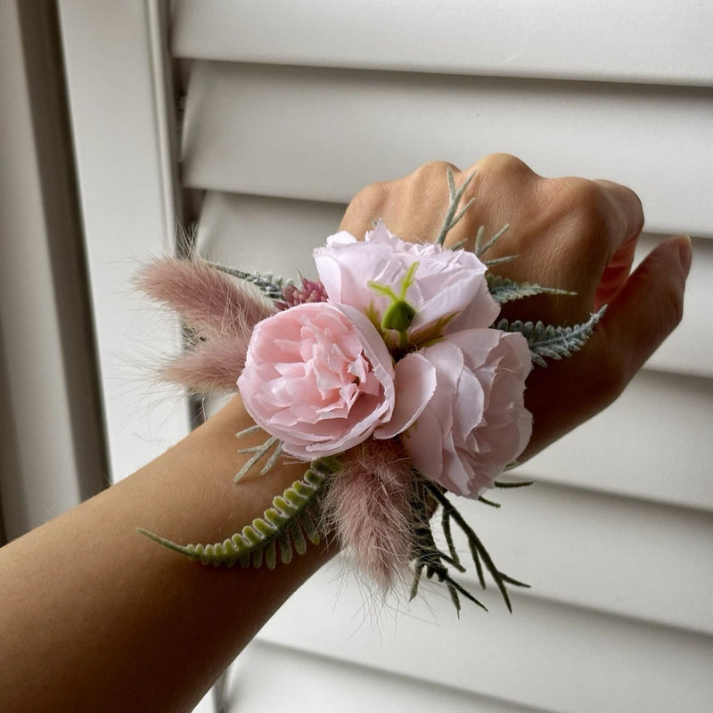 Light pink peony corsage with faux dried florals and soft feather accents