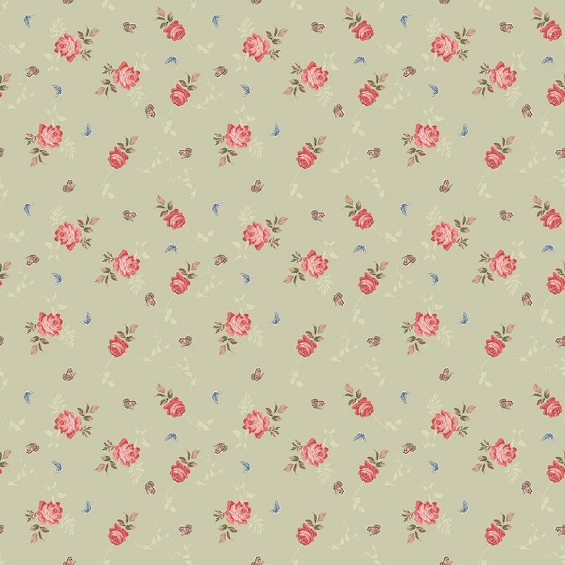 Rose floral cotton fabric with small pink blooms and blue accents on light sage