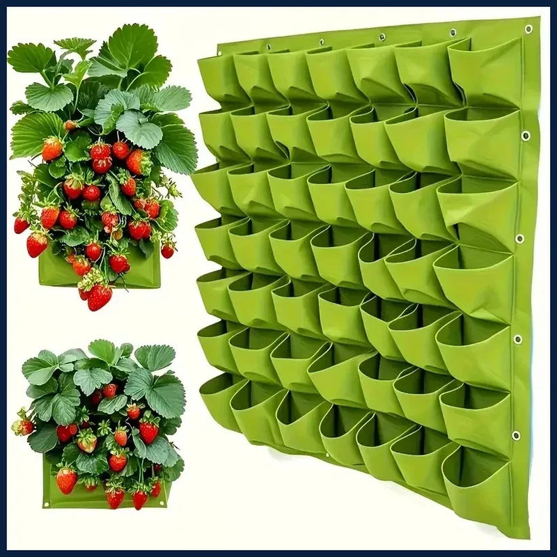 Green wall-mounted vertical garden planter with 18 fabric pockets for herbs and plants
