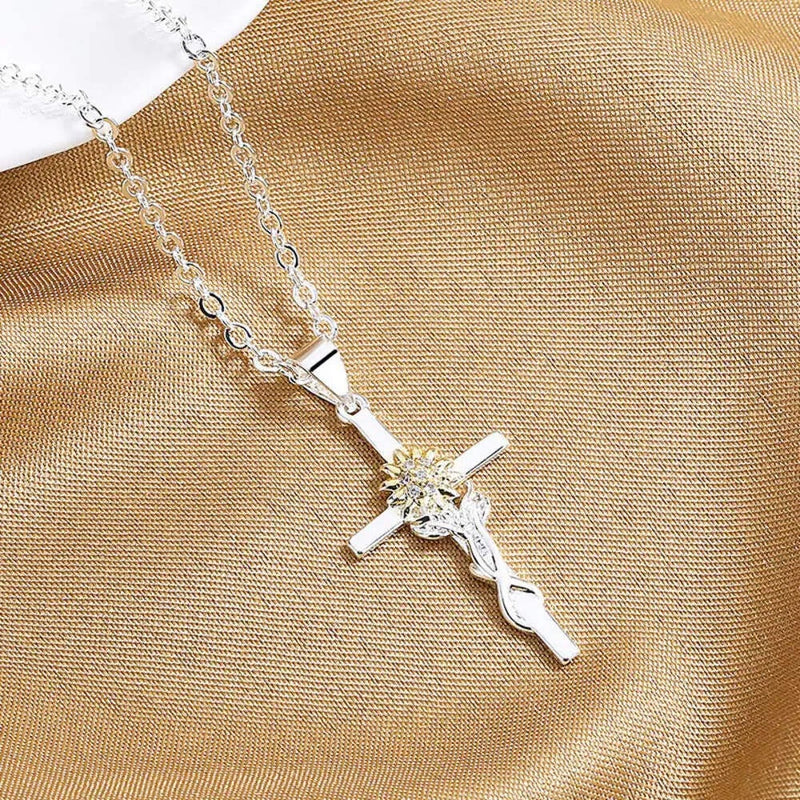 Two-tone sunflower cross pendant necklace, silver chain and gold details
