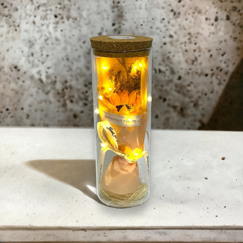 LED forever flower lamp with sunflower in glass dome, warm lights, cork top