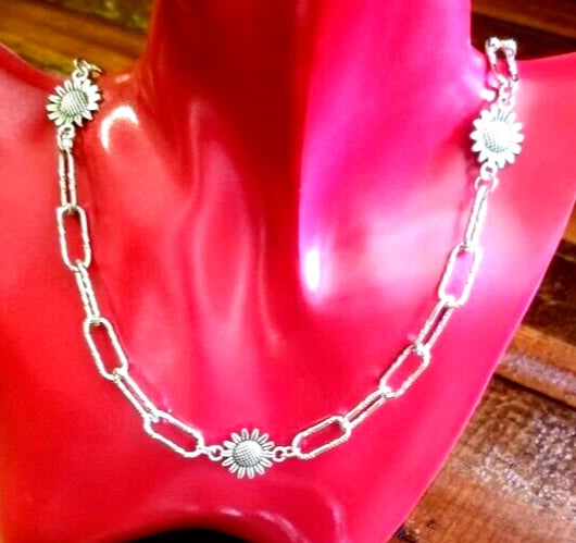 Silver sunflower charm paperclip chain necklace with small flower links