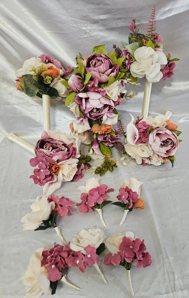 Ivory, pink and purple wedding bouquet set with three floral bouquets and ribbon bows