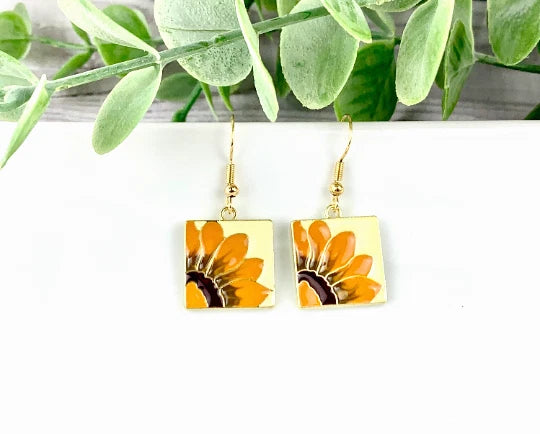 Sunflower dangle earrings with square orange flower paintings and gold-tone hooks