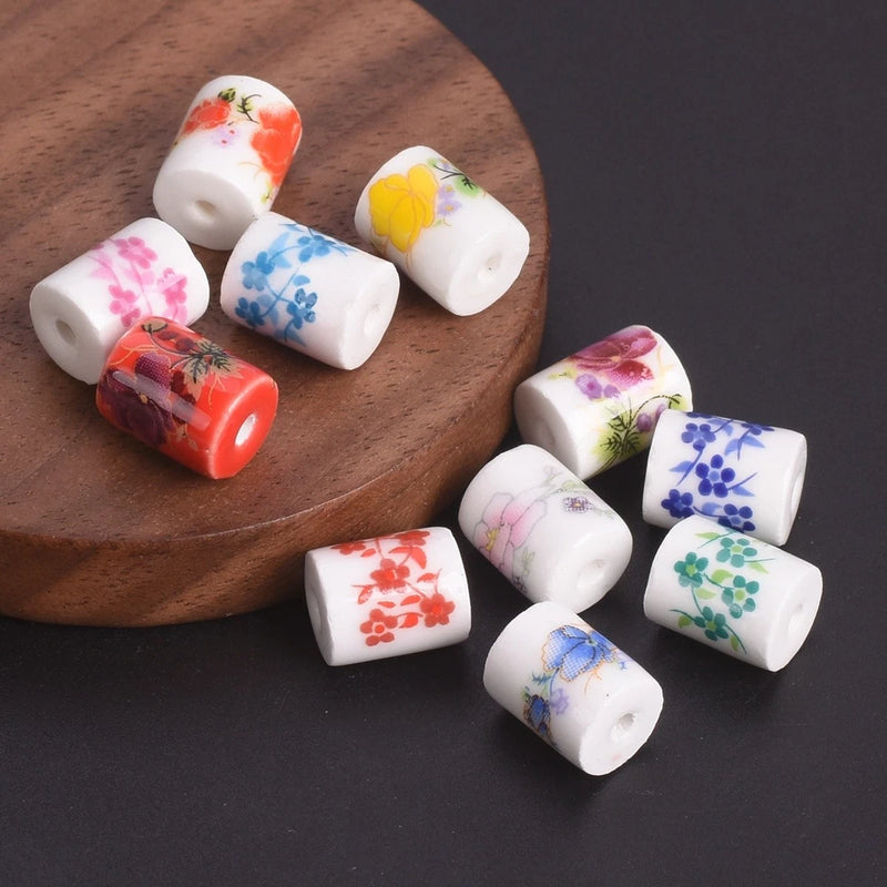 Ceramic cylinder beads with colorful sunflower and floral patterns, craft loose beads set
