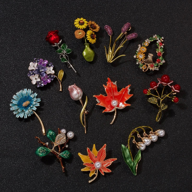 Vintage enamel flower brooch set with colorful blooms and pearl accents