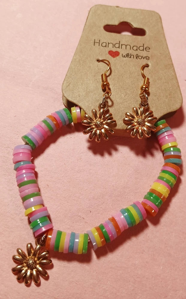 Colorful beaded sunflower bracelet and drop earrings set with striped hoops and copper flowers