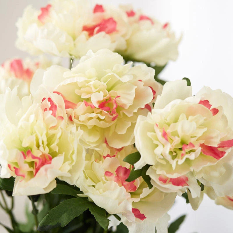 Cream artificial peony floral bush with layered blooms and pink/red centers