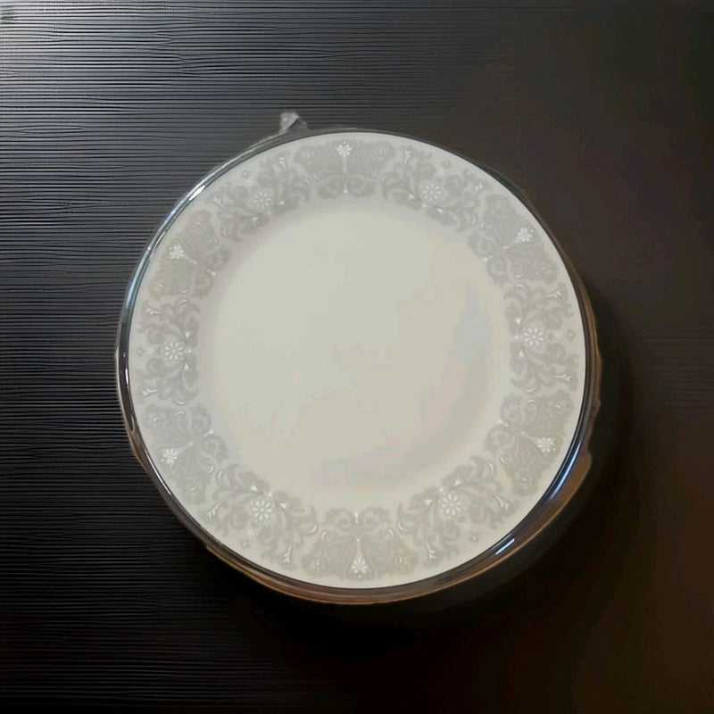 Porcelain lunch salad plate with white finish, platinum edge trim, and floral border