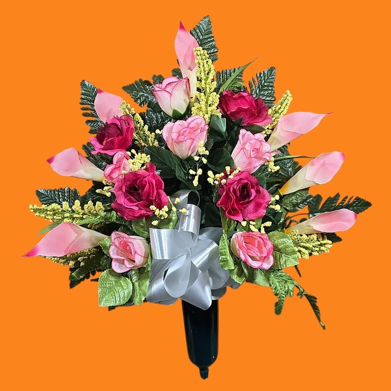 Cemetery cone flower arrangement with pink roses, calla lilies, and silver ribbon bow