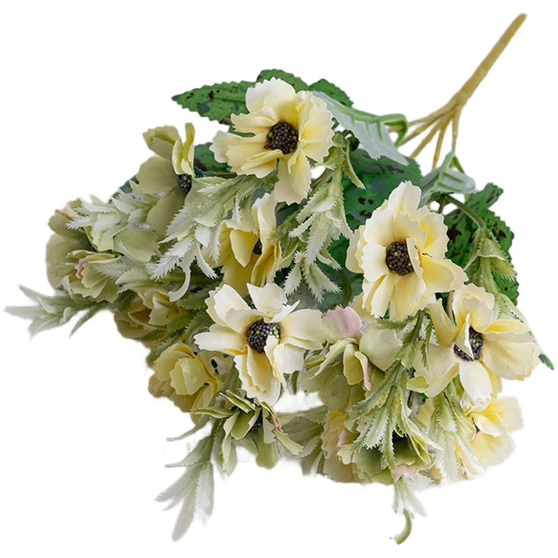 Artificial flower bouquet with cream-yellow blossoms, dark green leaves, and stems