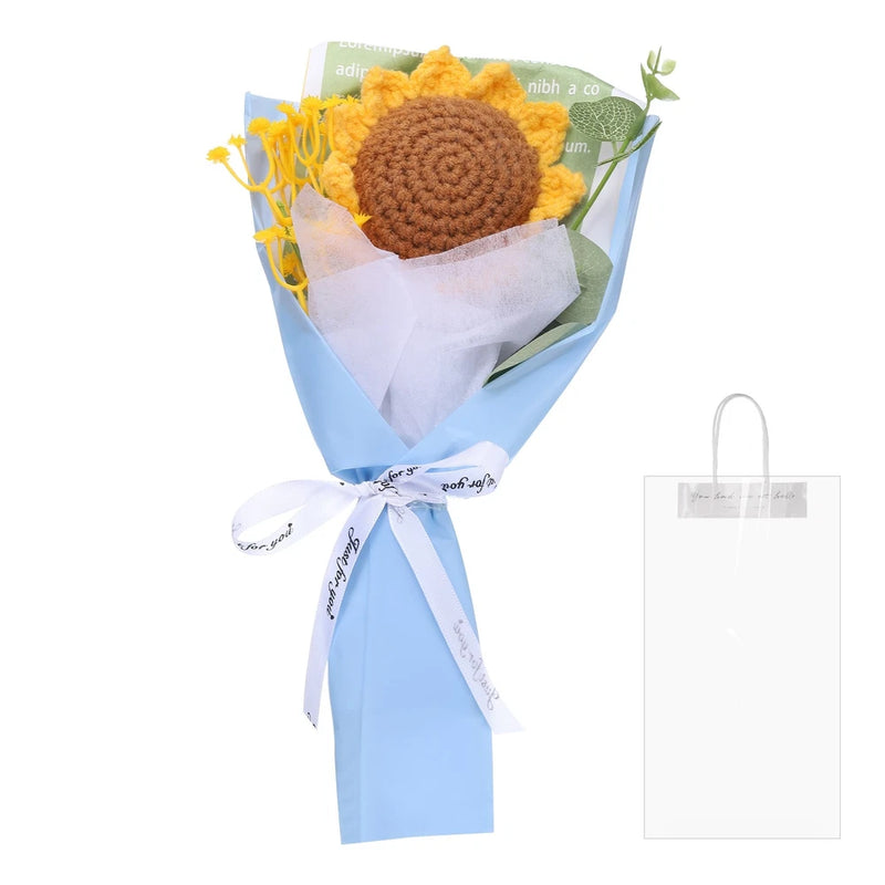 Handmade crochet sunflower bouquet with blue wrapping, yellow petals, and brown centers