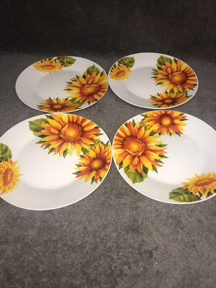 Set of four white ceramic salad plates with yellow sunflower prints, 8-inch