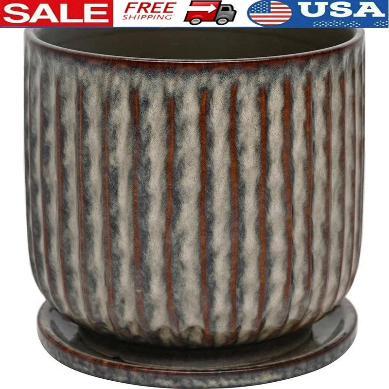 Gray ceramic ribbed planter pot with drainage saucer, round rim and base