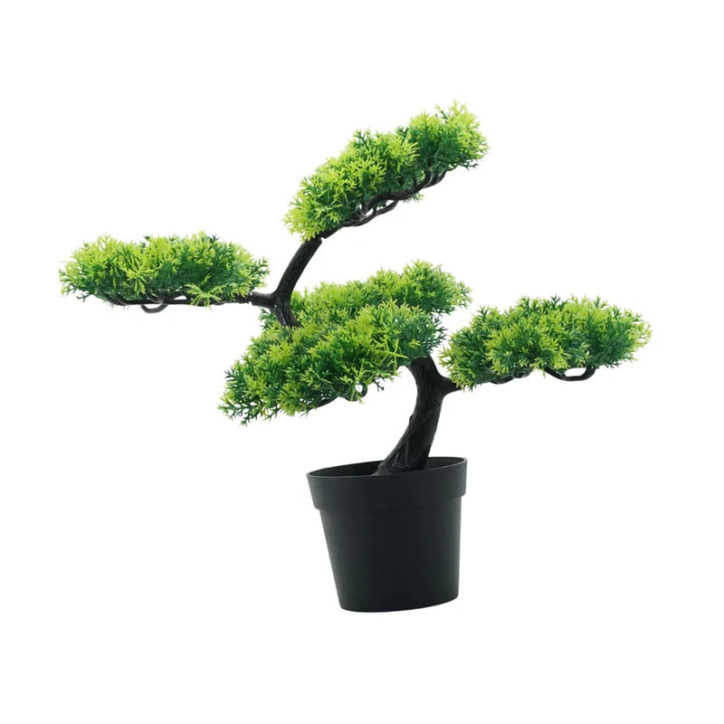 Artificial bonsai tree with green foliage in a black round pot.