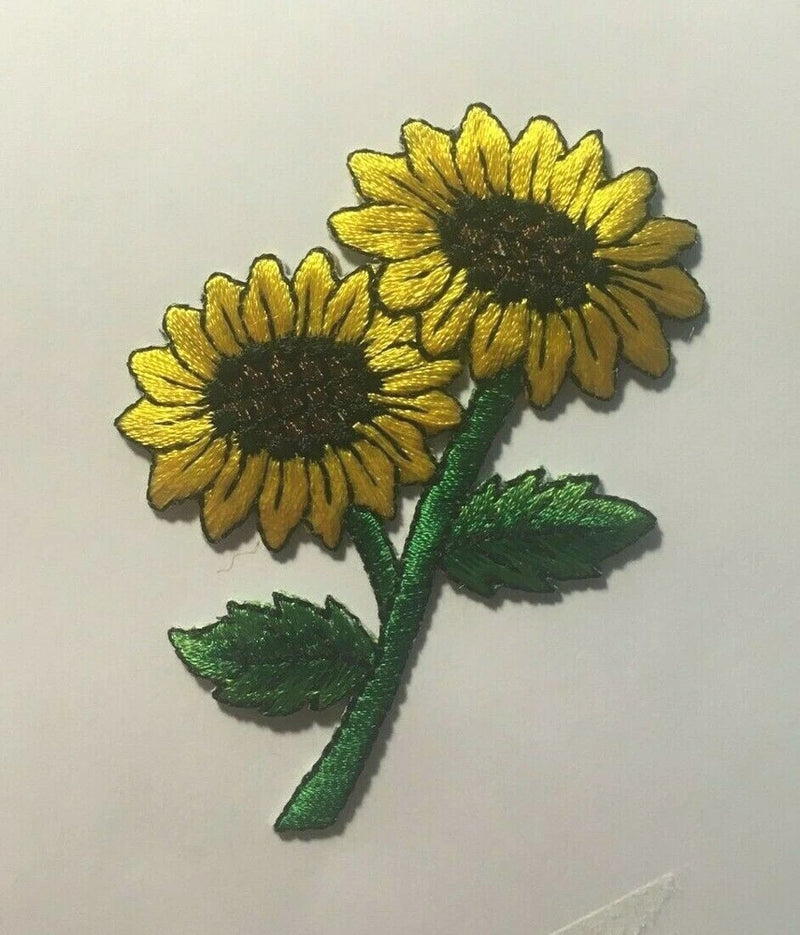 Sunflower flower patch with two yellow blooms and green leaves, iron-on or sew