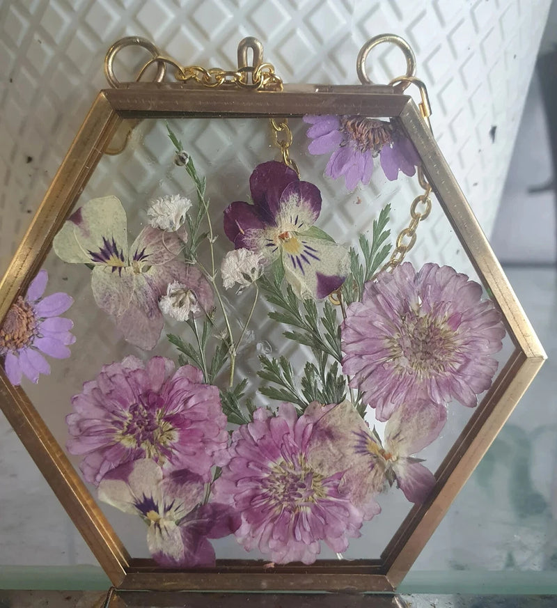 Hexagon glass flower frame wall art with pressed purple and white flowers