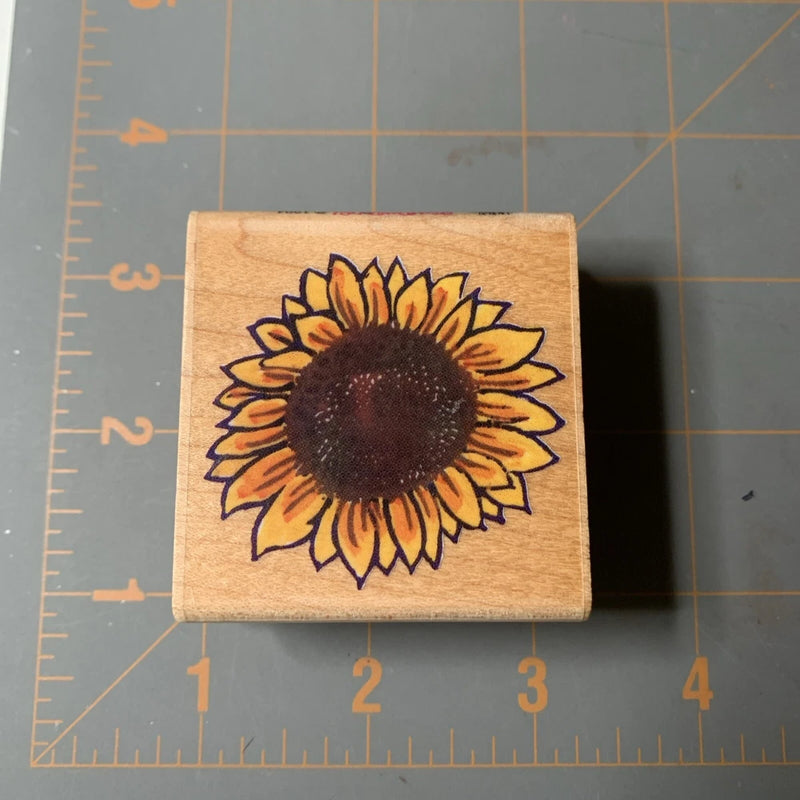 Stampendous rubber sunflower flower stamp with bold yellow petals and dark center