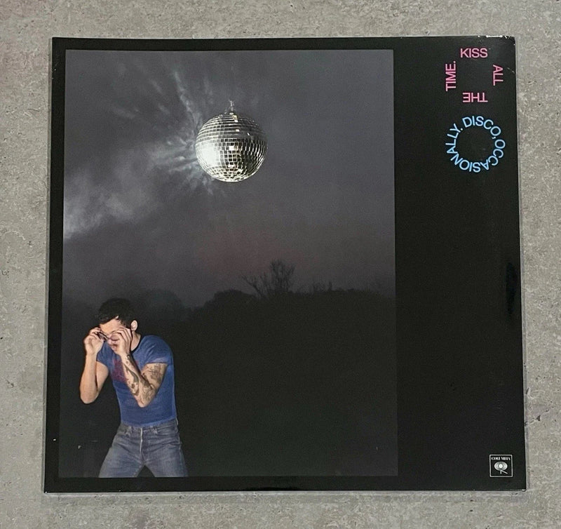 Sealed vinyl LP with disco ball cover art and dancing couple
