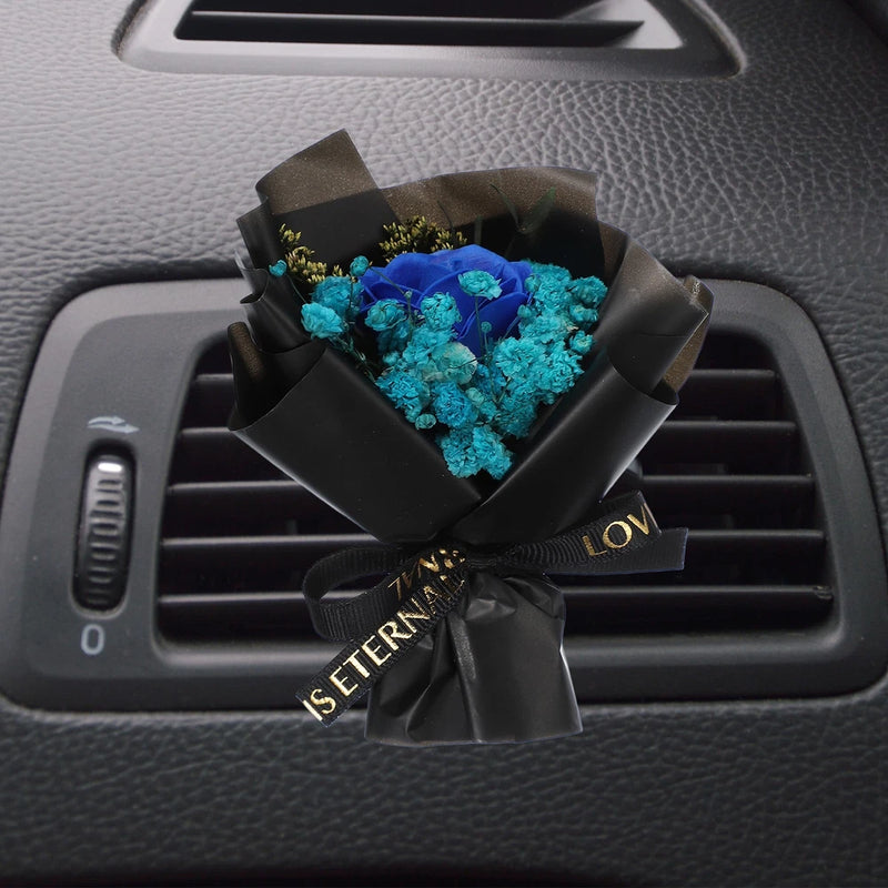 Car air vent clip with dark blue dried flower bouquet, black ribbon and charm