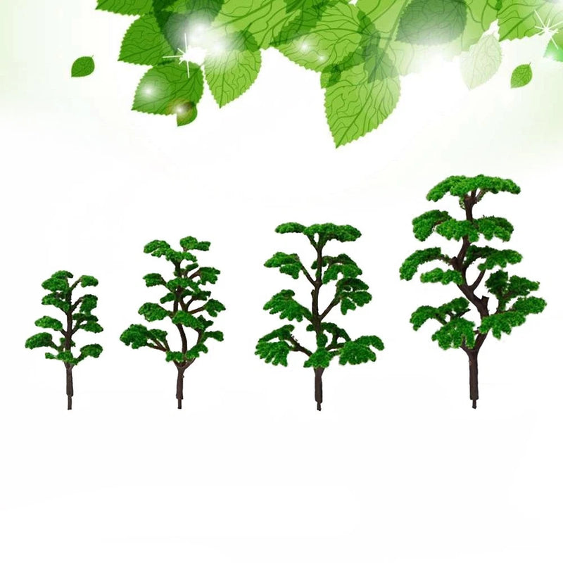 Set of mini artificial plastic model trees with green leafy foliage