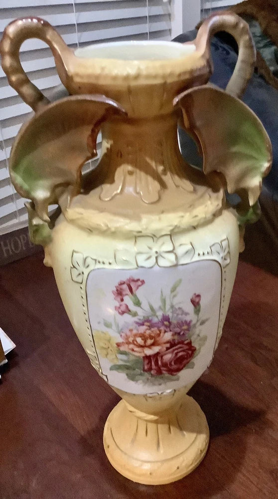 Tall antique vase, cream with gilt, double handles, scalloped rim, painted flowers.