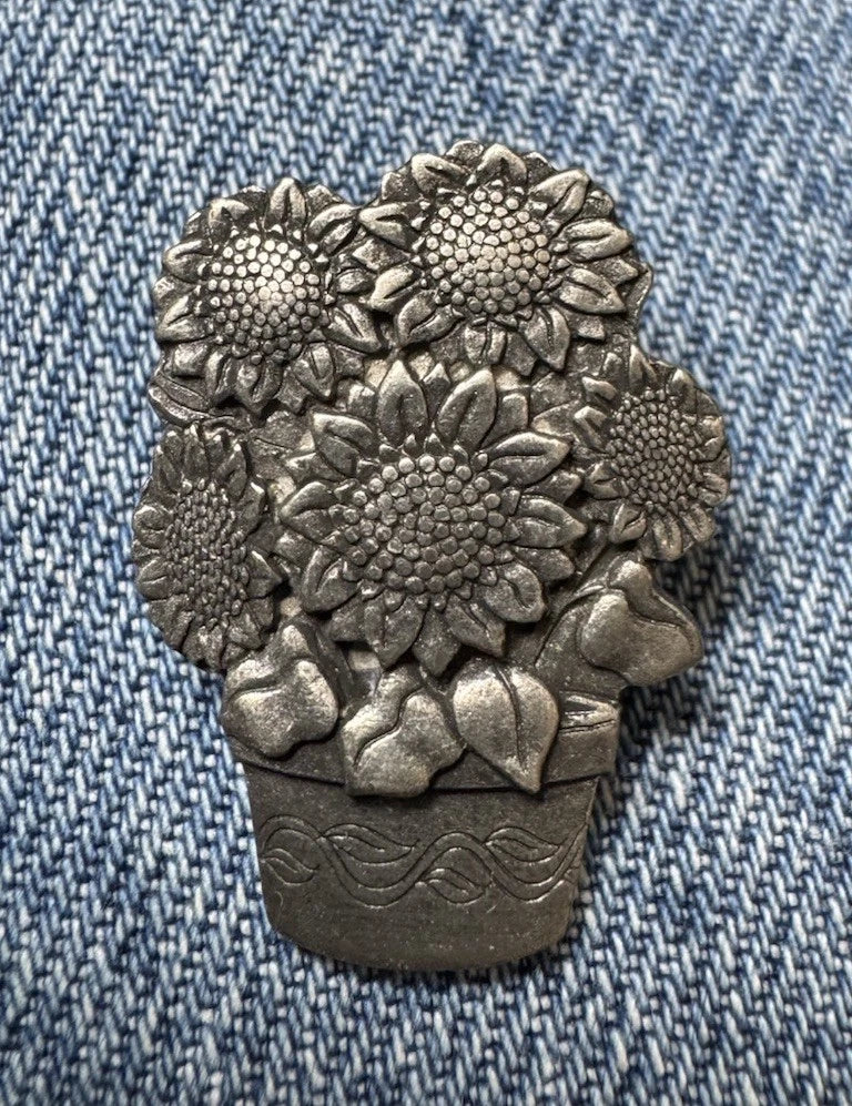 Pewter sunflower pot brooch pin with textured blossoms and leaves