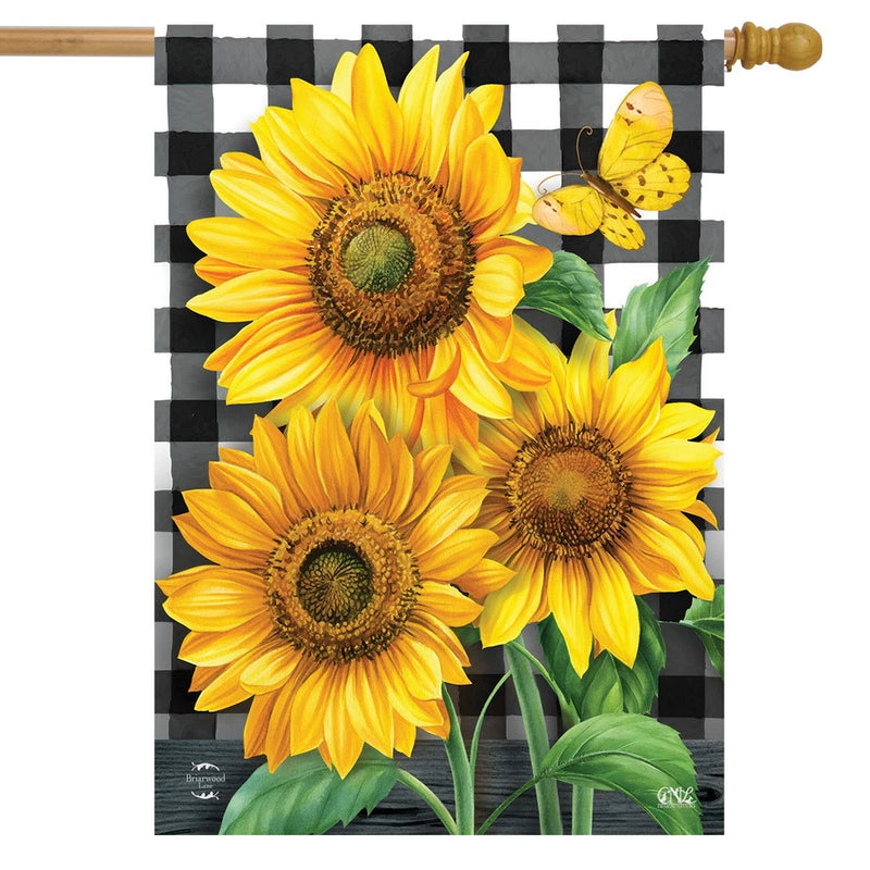 Checkered house flag with yellow sunflowers and green leaves