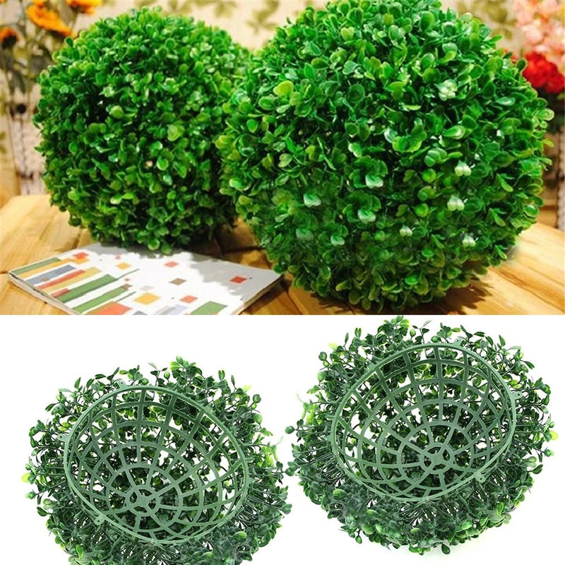 Set of two green faux plant sphere decorations with dense leafy texture