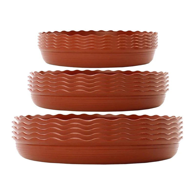 Terracotta round plant saucers with ridged wavy edges, stack of 3