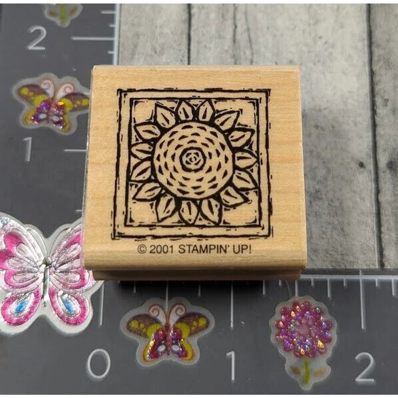 Rubber stamp with sunflower framed floral design, wooden handle, "© 2001 Stampin' Up!"