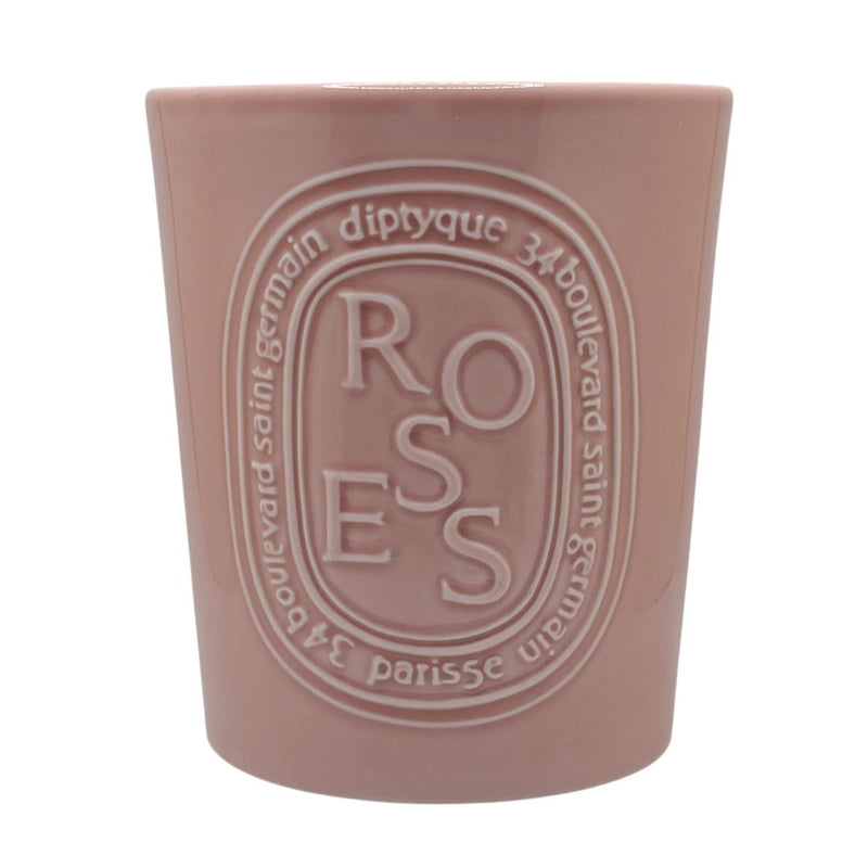 Diptyque ROSES wax candle, rose-pink matte container with embossed ROSES lettering
