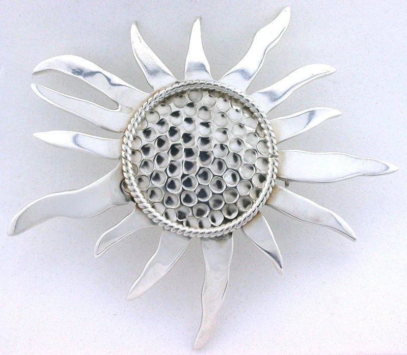 Sterling silver sunflower pin brooch with textured center and raised petal design