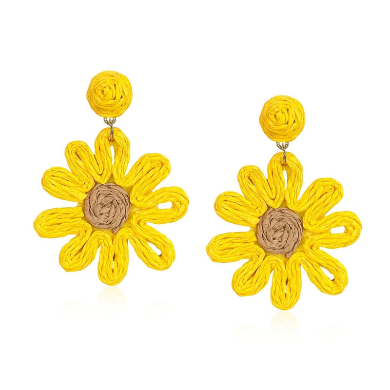Yellow raffia sunflower drop earrings with textured gray center and gold-tone hooks