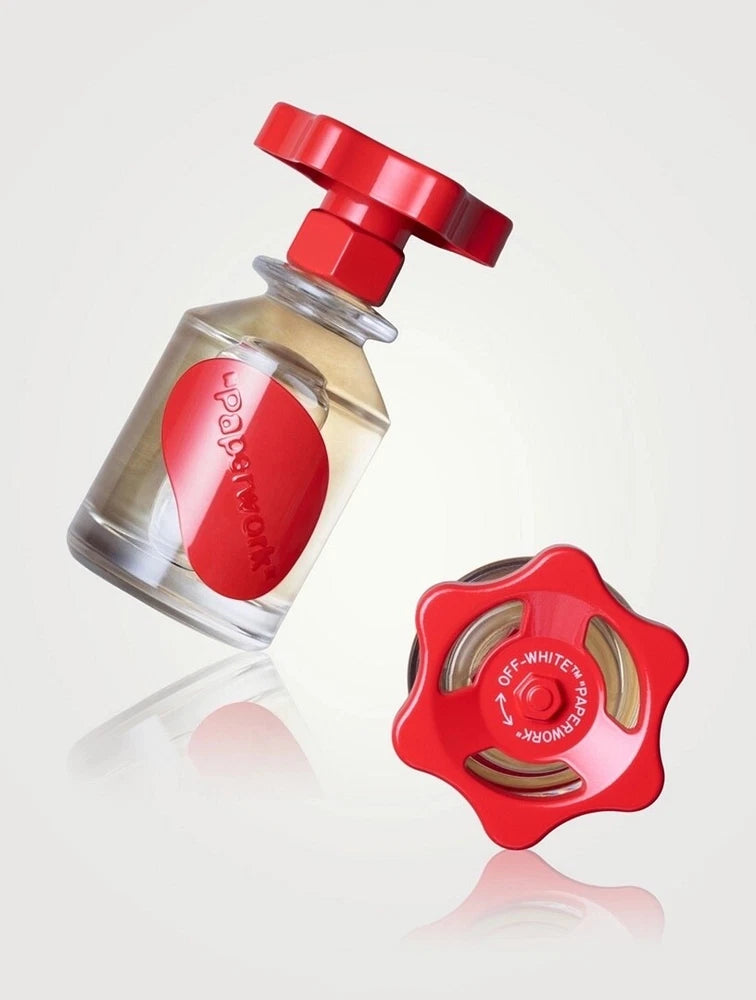 Off-white fragrance perfume bottle with red cap and flower-shaped stopper