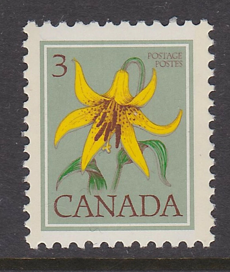 Canada lily floral definitive postage stamp, yellow flower with green leaves, Canada text