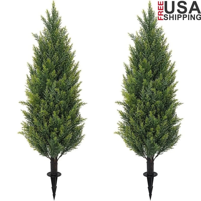 Artificial cedar topiary trees, two conical faux evergreens in black stakes