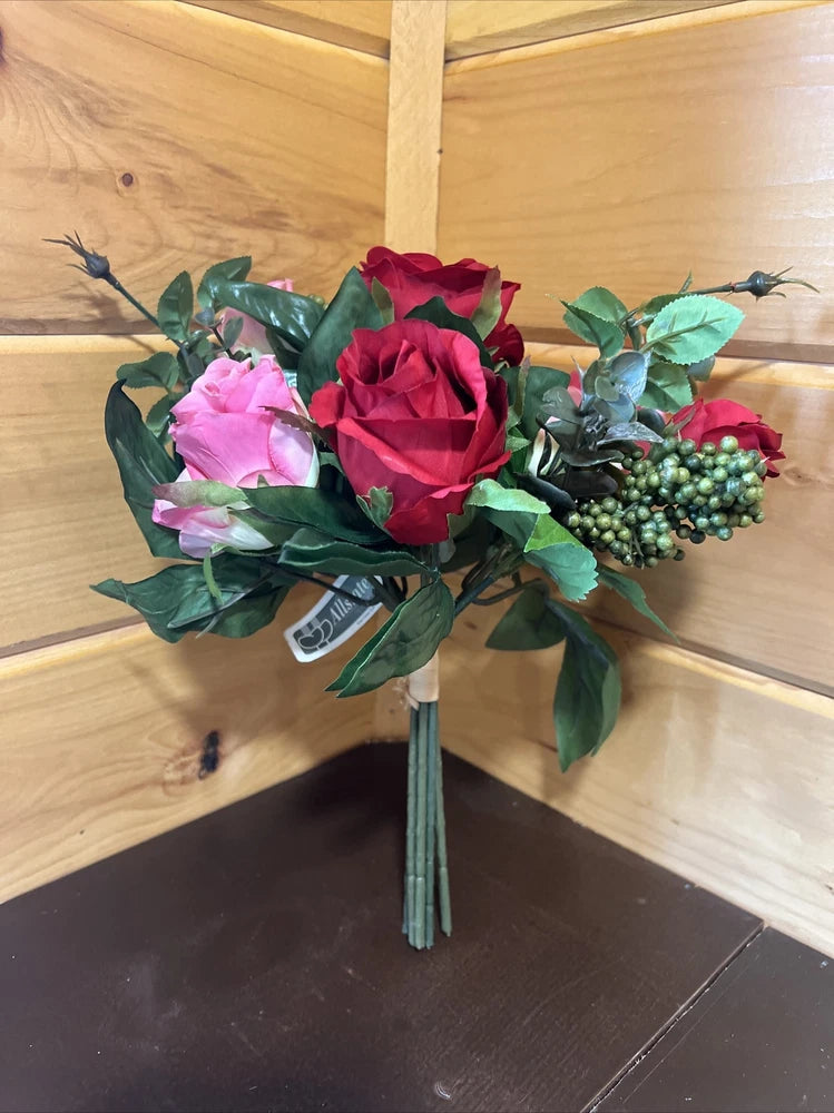 Faux rose bouquet with red and pink roses, green leaves, and berry accents