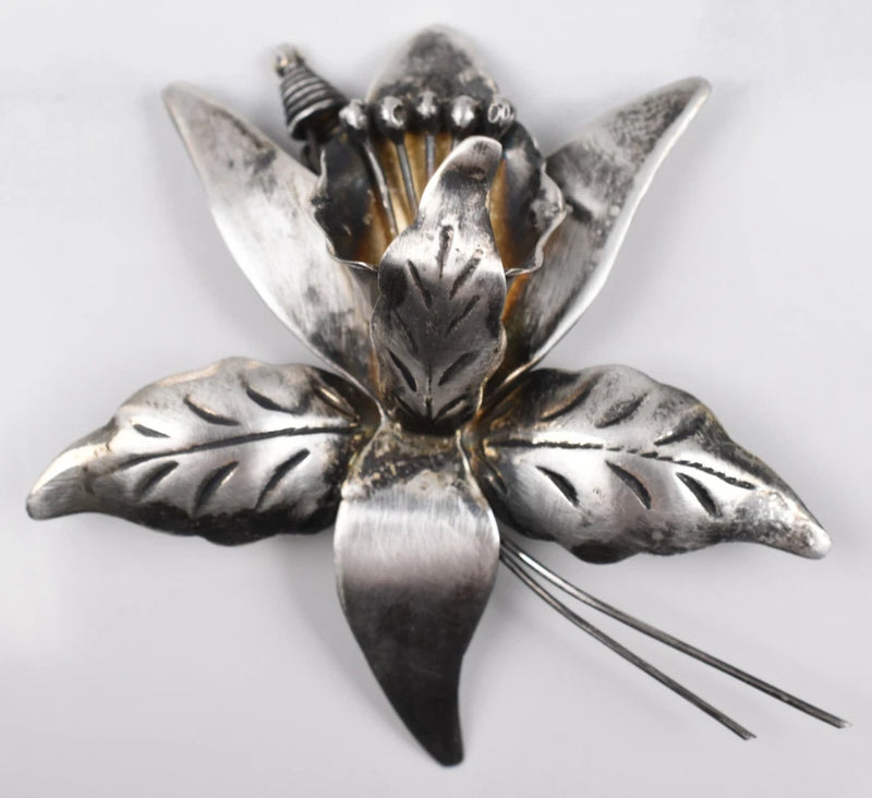 Sterling silver lily flower pin brooch with detailed petals and two straight pin backs