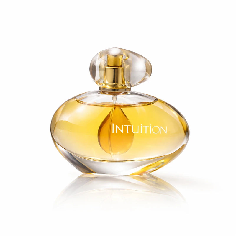 Intuition women's eau de parfum bottle with gold cap, clear glass, oval shape